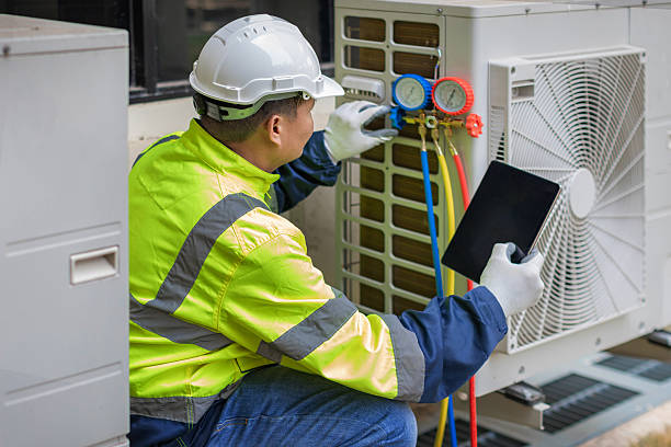 Professional Hvac technician working in Huntingtown, MD